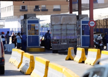 GRAF5893. MELILLA, 14/08/2018.- Camiones en la frontera de Beni-Enzar tras la decisión de Marruecos de cerrar la aduana comercial. El Gobierno español aseguró hoy que defenderá los intereses de la ciudad española norteafricana de Melilla ante la decisión de Marruecos de cerrar la aduana comercial en la frontera de Beni-Enzar. EFE/F.G.Guerrero