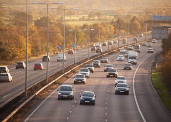 winter sun on sunday motorway traffic Essex England